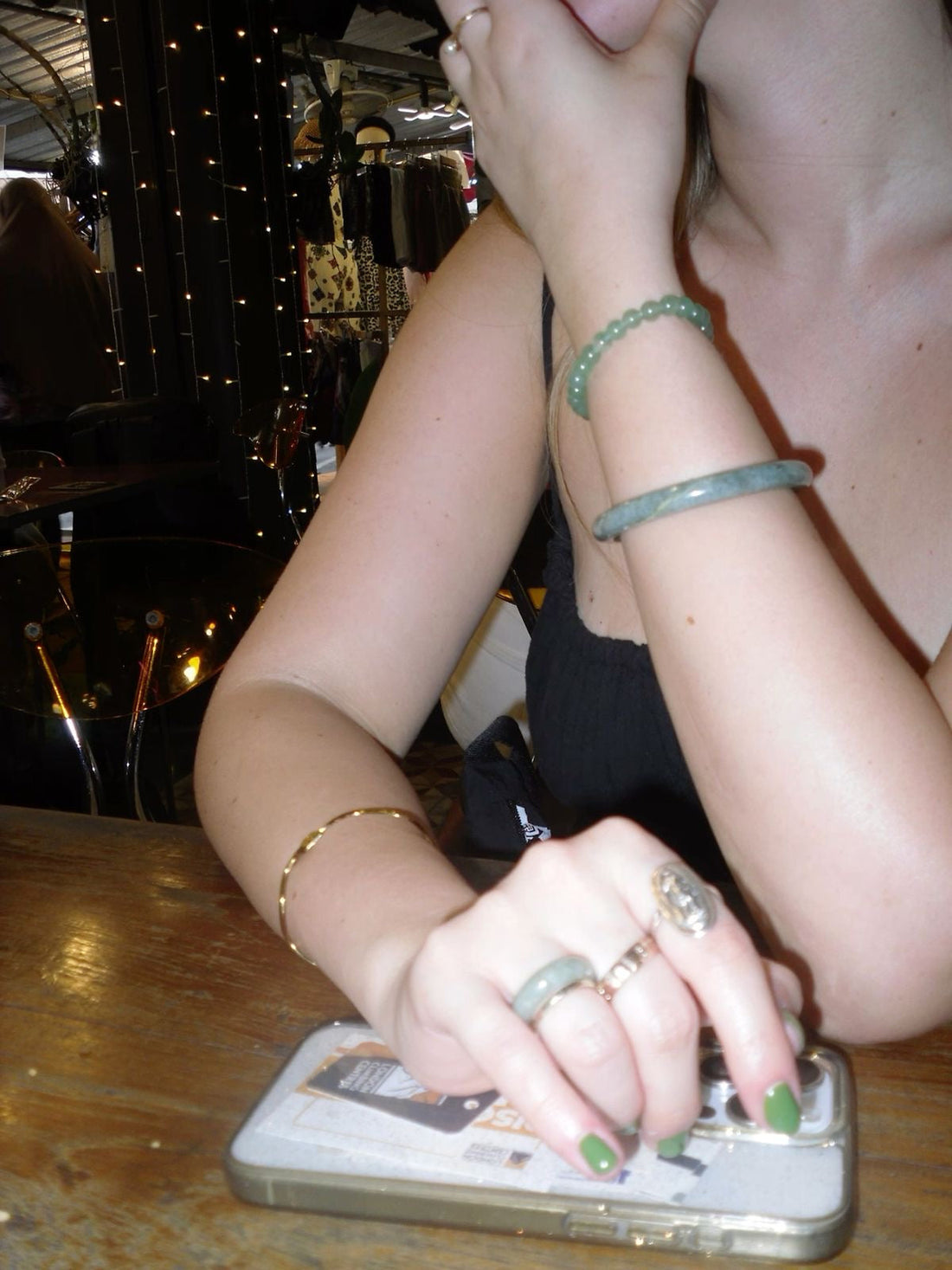 Elegant jade necklace styled with white silk shirt