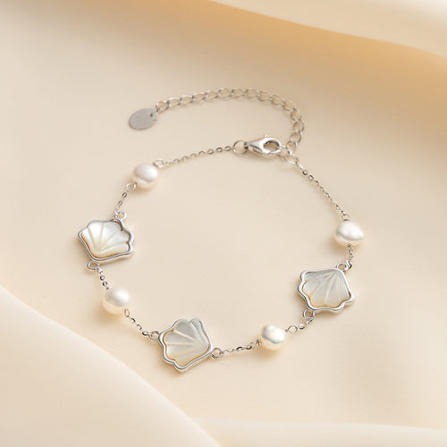Sterling silver pearl shell bracelet displayed on soft background – elegant jewellery for women