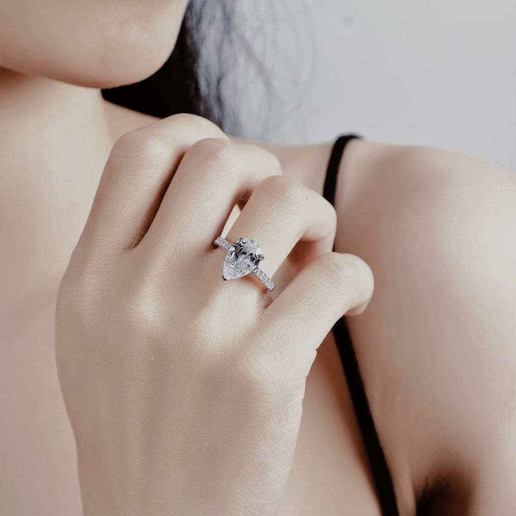 Pear-shaped cubic zirconia engagement ring in sterling silver, photographed for Lotus And Rose jewellery collection