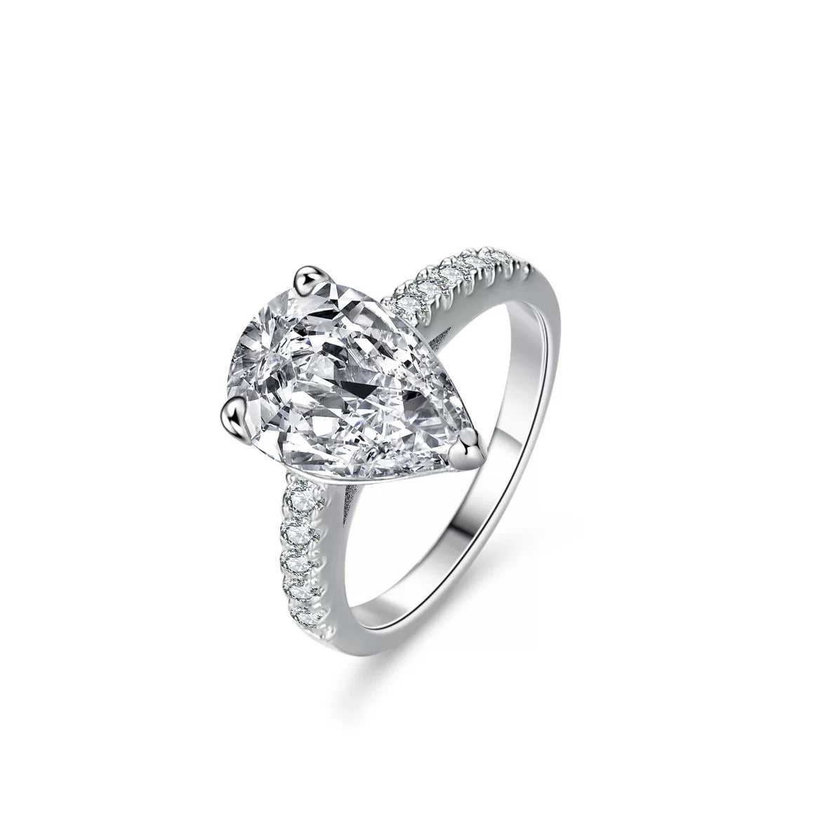 Elegant pear-cut sterling silver engagement ring with pavé band, worn on hand for a sophisticated look