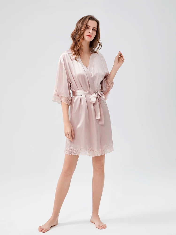 Model wearing vintage blush pink silk robe with lace trim and self-tie belt – elegant short silk robe