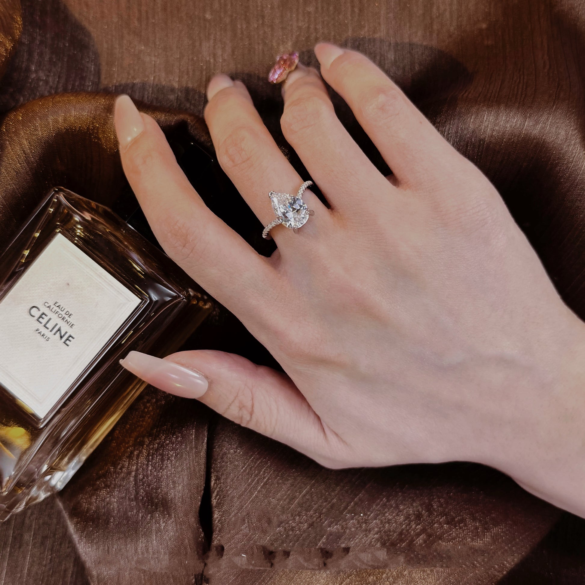 Elegant pear-shaped silver ring for women, ideal for engagement, anniversary, or statement wear