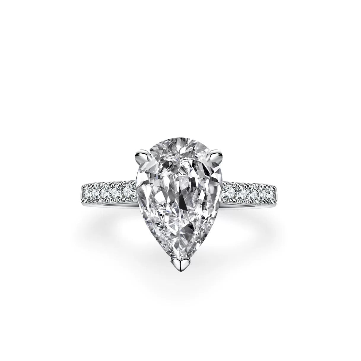 Side view of sterling silver pear-cut engagement ring with micro pavé band