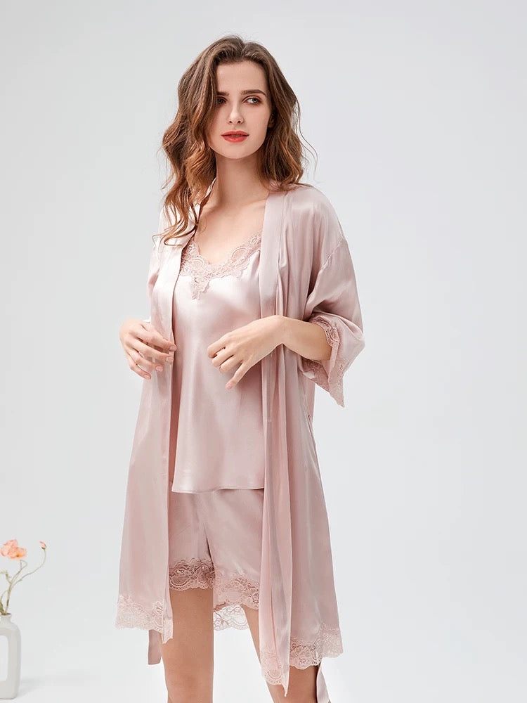 Bridal style blush pink silk robe with lace trim, worn over matching slip dress – luxury wedding morning robe